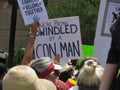 Signs at U.S. political rally: pro immigrants, anti Trump Royalty Free Stock Photo